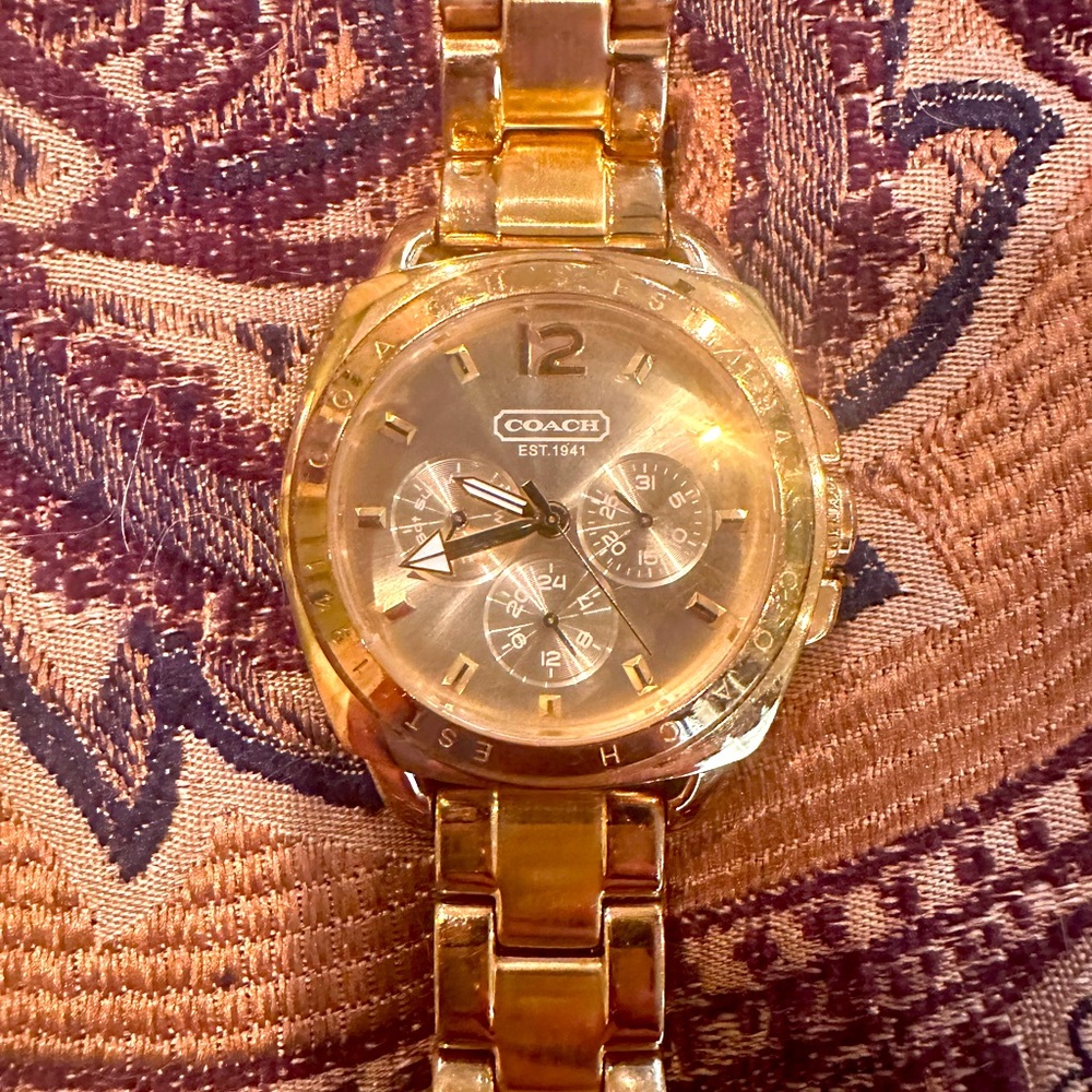 Coach watch with gold band
